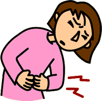 腹痛に顔をしかめる女性
