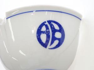 明和高校の校章の部分を拡大した写真です。